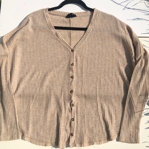 light brown sweater